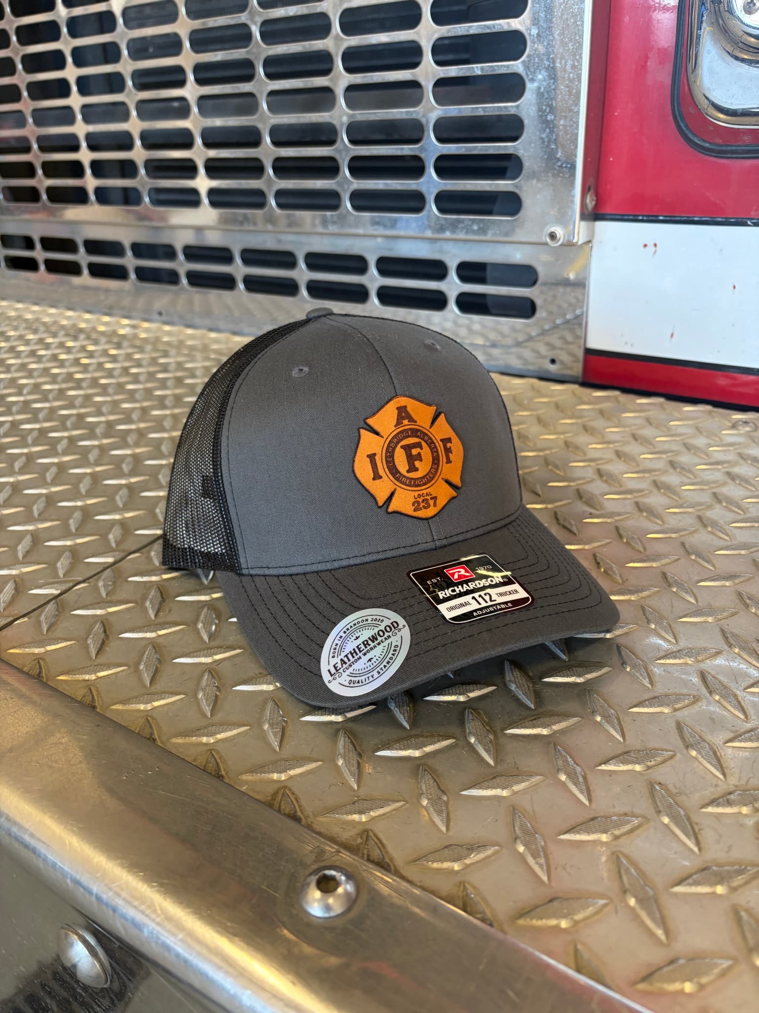 The supplied charcoal Local 237 Cap with its orange IAFF Local 237 patch
