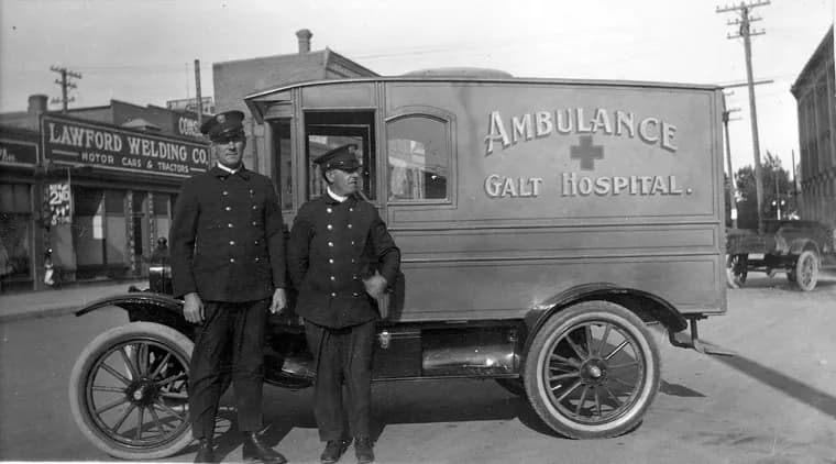 Firefighters beside the ambulance transferred from Galt Hospital in 1912