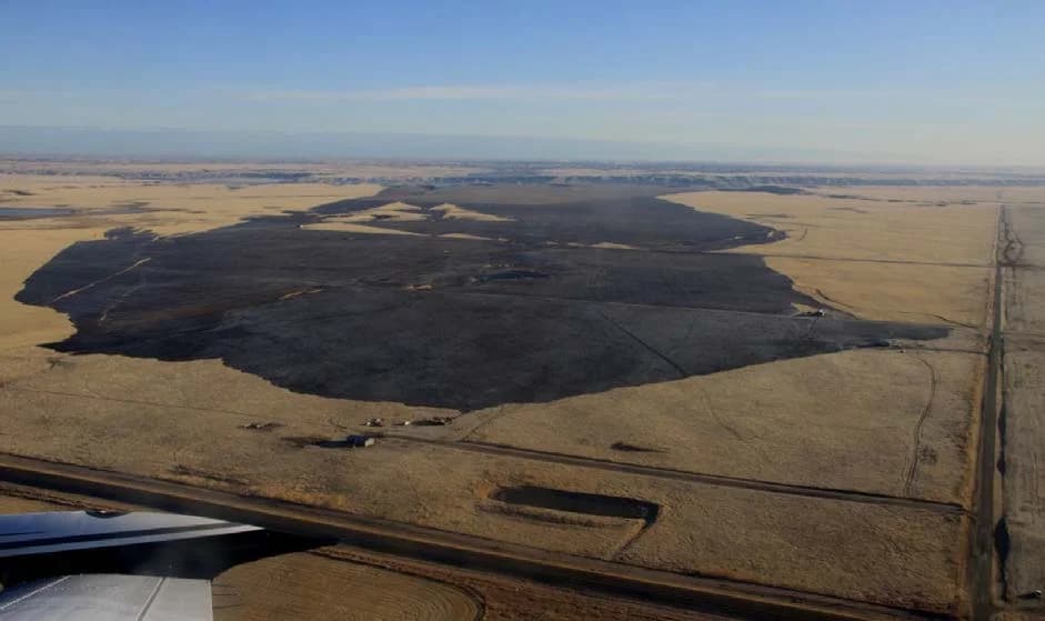 Aerial view of the burned landscape near Lethbridge on November 28, 2011, the morning after the grassfire