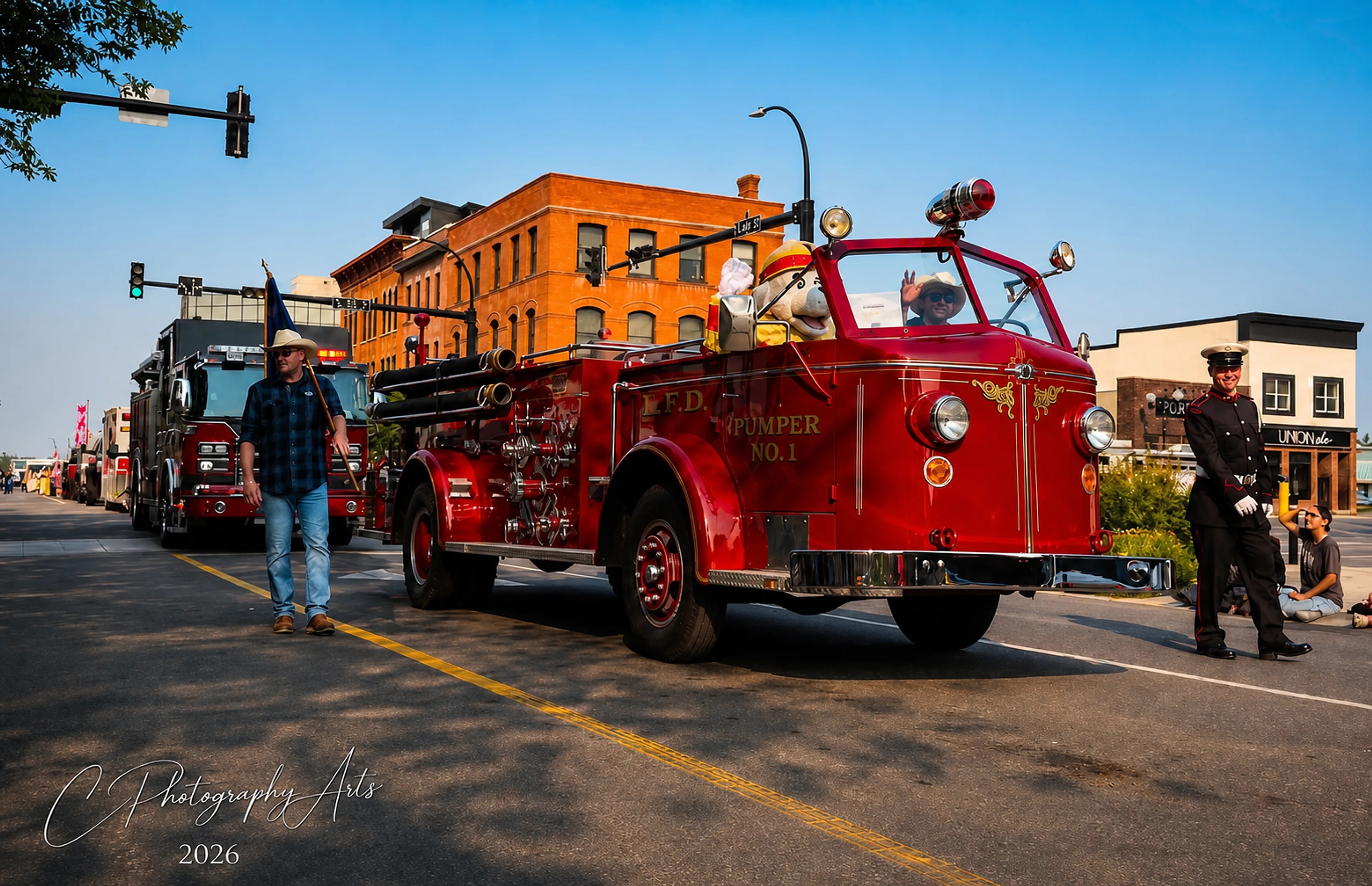 Historic fire engine leading a downtown Lethbridge parade